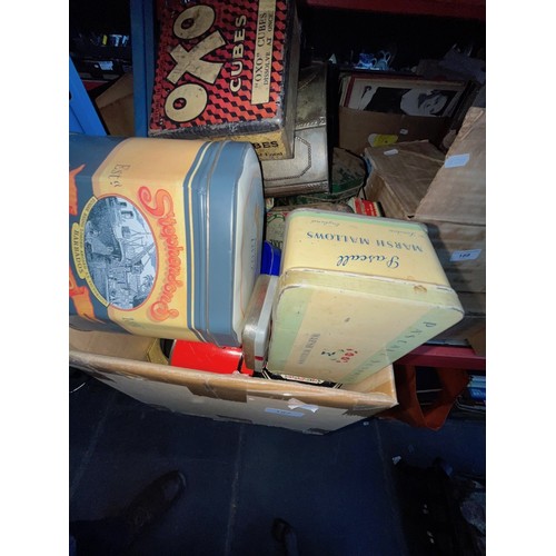 187 - A box of old tins and a metal tray.