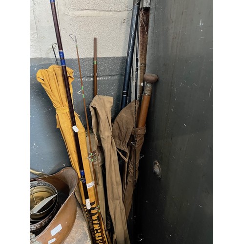 104 - Assorted fishing rods including split cane, wood, Milbro etc.