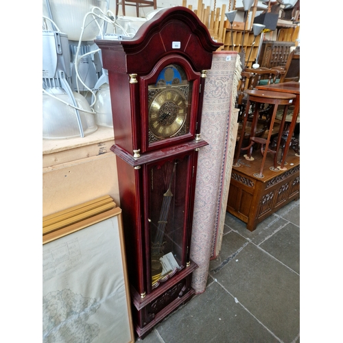 986 - A reproduction grandfather clock with brass dial, weights and pendulum.