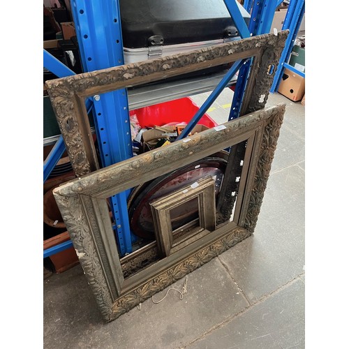 201 - Two old gilt picture frames together with three others.