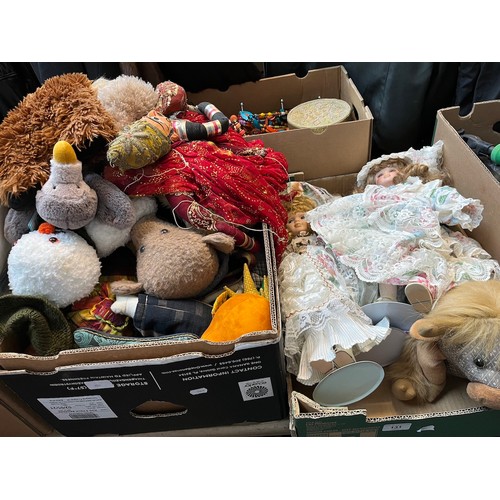 131 - 2 boxes of dolls and soft toys