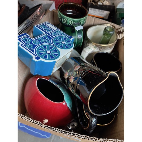 191 - A box of various ceramics to include Poole Pottery, Carltonware, West German vase and Tolston, etc.