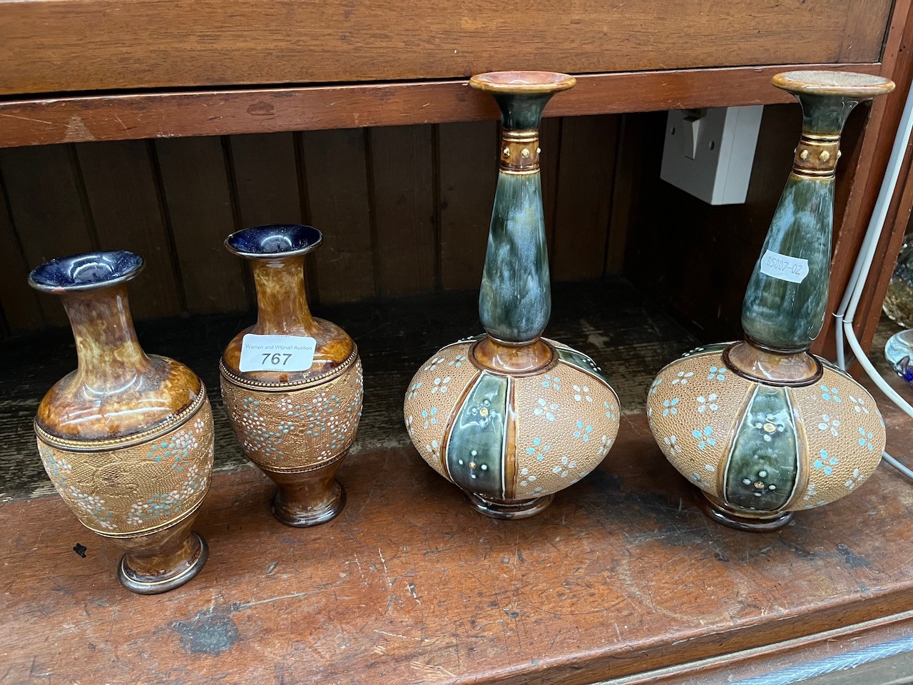 Two pairs of Doulton Lambeth ware vases. 1 pair appx 25cm tall with