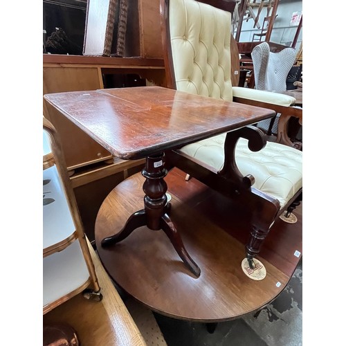 915 - A 19th century mahogany tripod table.