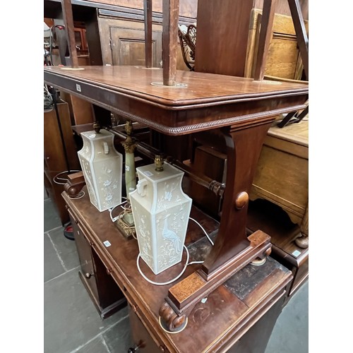 903 - A William IV mahogany library table.