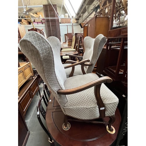 921 - A pair of vintage French style oak framed armchairs.