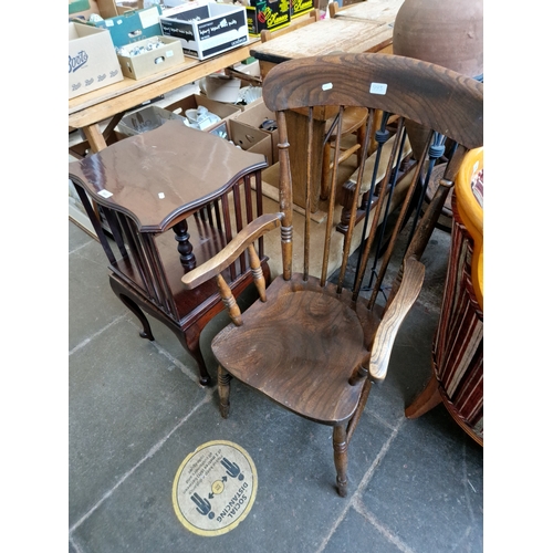 993 - An Edwardian mahogany revolving bookcase and a beech and elm chair.