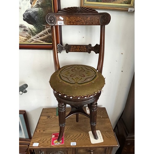 1012 - A 19th century inlaid rosewood adjustable piano stool.