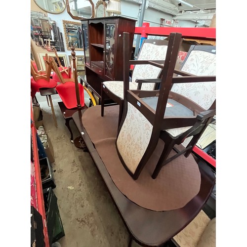 1004 - A Stag mahogany dresser together with a Stag mahogany dining table and four chairs.