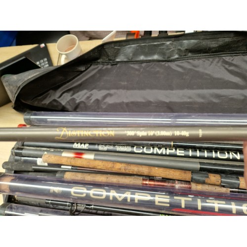 130 - A collection of coarse fishing tackle including carbon pole, carp rods, spinning rod, whips, pole ro... 