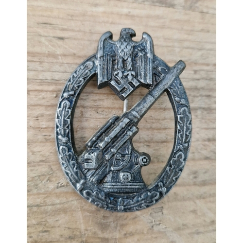 47 - A German WWII Anti Aircraft Flak badge, by Glaser & Sohn, Dresden, marked 