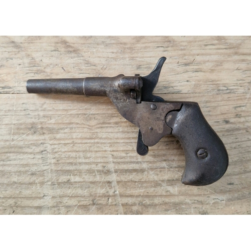 66 - A 19th century German parlour pistol, marked D.R.G.M.