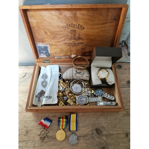 75 - A wooden box containing various items of militaria and collectables including King's Regiment silver... 