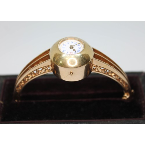 44 - A late Victorian/Edwardian ladies bangle watch, white enamel dial with outer gold dot minutes, blue ... 