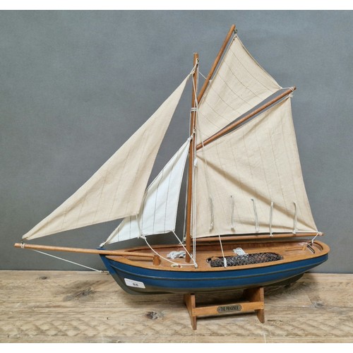 88 - A model boat on stand, 'THE PRAWNER', length 59cm.