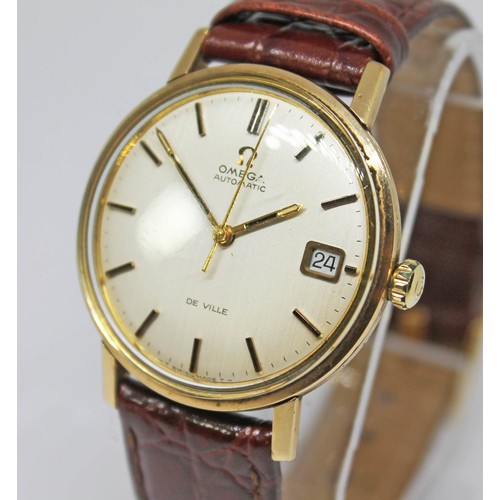 42 - An Omega De Ville 9ct gold automatic wristwatch, case diam. 34mm, signed silvered dial, gold tone ba... 