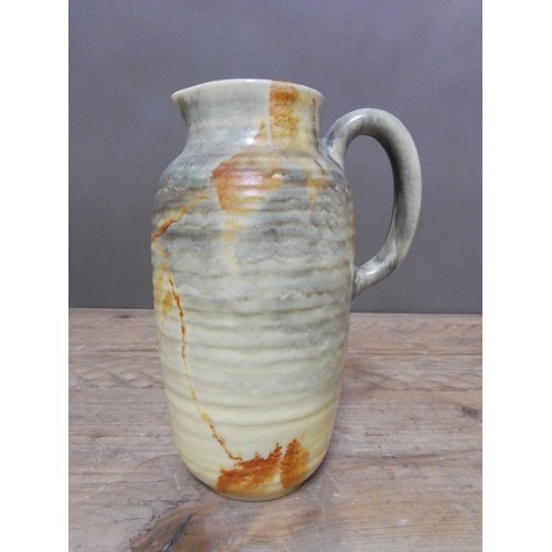 106 - A Clarice Cliff Greek shaped jug, height 23.5cm.