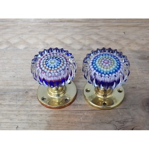 117 - A pair of Perthshire millefiori glass paperweight door knobs.