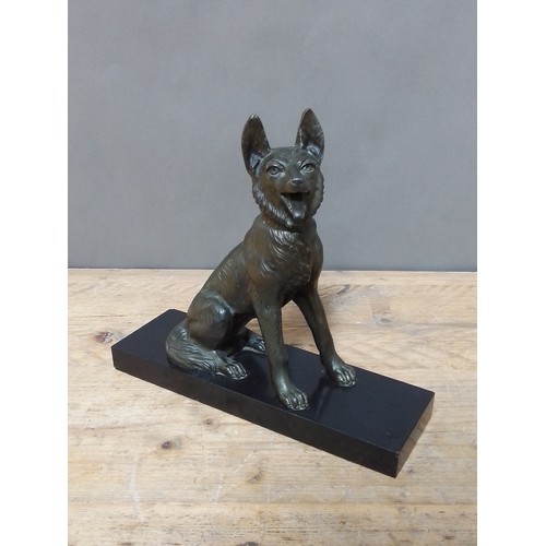 173 - An Art Deco bronzed spelter figure of a dog on black slate base, height29cm.