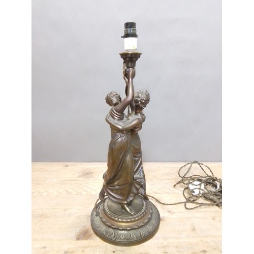 149 - A late 19th century weight spelter lamp base, height 53cm.