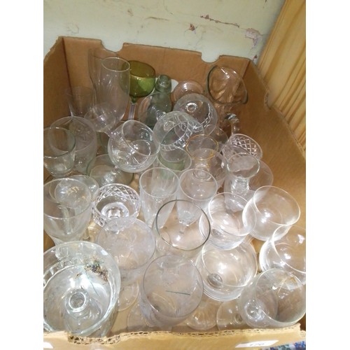 170 - A box of assorted glassware.