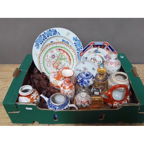 143 - A box of assorted oriental items comprising porcelain, both Chinese and Japanese, metalware, wood ca... 