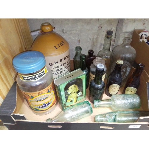 189 - A box of assorted named bottles including a full bottle of Masseys Pale Ale, also including a stonew... 