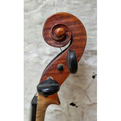 205 - A Stradivarius copy violin, two piece back, length 360mm, in case with bow.