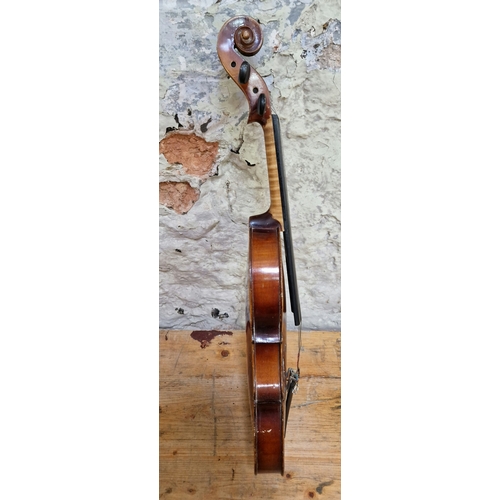 208 - A German violin, labelled 'Copy of Antonius Stradivarius', two piece back, length 395mm, with case.