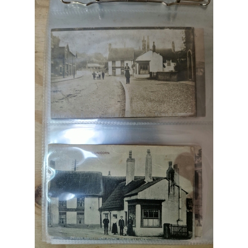 213 - An album containing approximately 100 early 20th century monochrome Preston postcards.