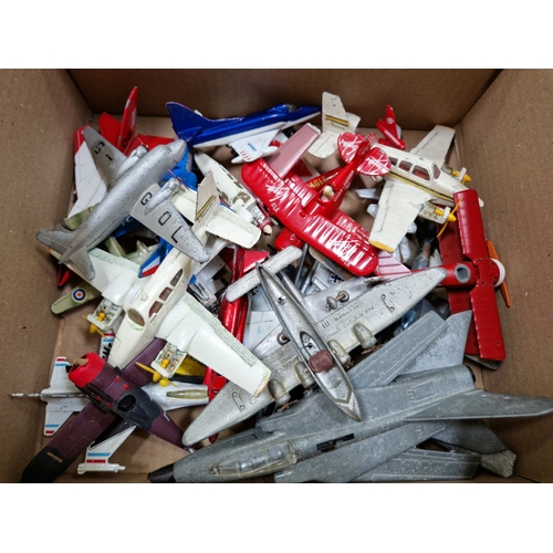 233 - A box of 25 vintage and modern die cast model aircraft; Dinky toys by Meccano, Matchbox etc.