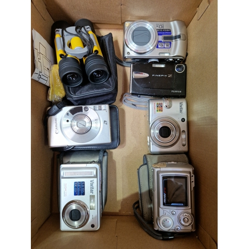 263 - A box of cameras to include CAnnon, Panasonic & Fujifilm etc.