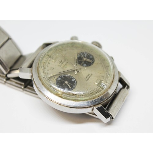 15 - A Dugena stainless steel chronograph wristwatch, circa 1970, diam. 38mm, silvered dial with two blac... 