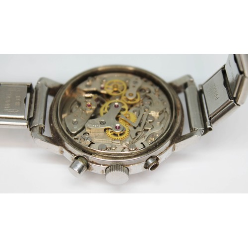 15 - A Dugena stainless steel chronograph wristwatch, circa 1970, diam. 38mm, silvered dial with two blac... 