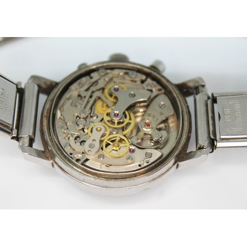 15 - A Dugena stainless steel chronograph wristwatch, circa 1970, diam. 38mm, silvered dial with two blac... 