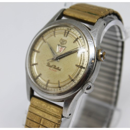 10 - A Paul Buhre stainless alarm wristwatch, circa 1950s, case diam. 30mm, champagne dial, 17 jewel manu... 