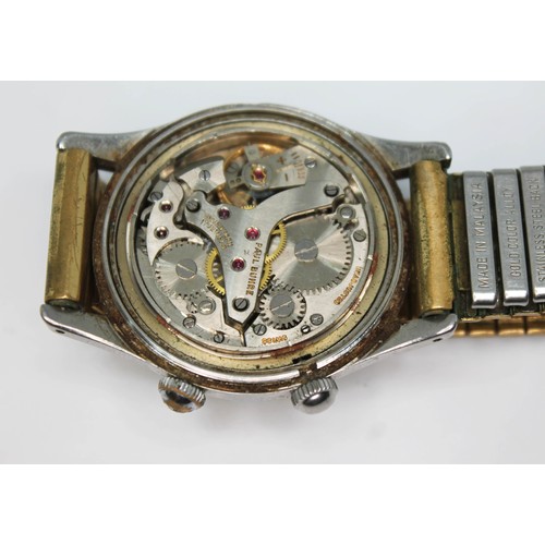 10 - A Paul Buhre stainless alarm wristwatch, circa 1950s, case diam. 30mm, champagne dial, 17 jewel manu... 