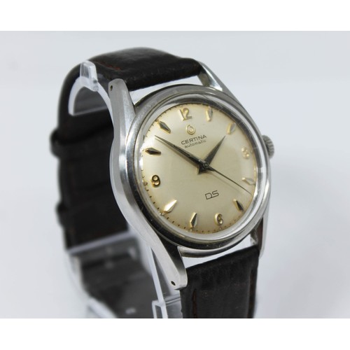 7 - A Certina DS stainless steel automatic wristwatch, circa 1970, diam. 35mm, signed champagne dial wit... 