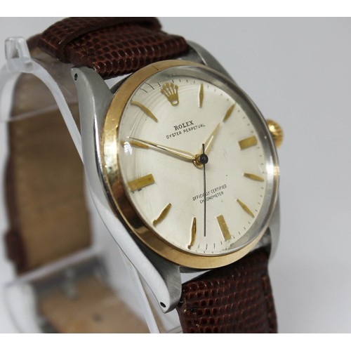 1 - A Rolex Oyster Perpetual gold and stainless steel automatic wristwatch, circa 1959, diam. 34mm, ref.... 