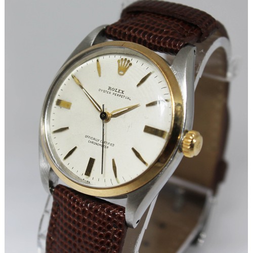 1 - A Rolex Oyster Perpetual gold and stainless steel automatic wristwatch, circa 1959, diam. 34mm, ref.... 