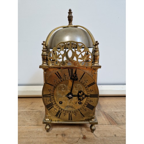 282 - A 19th century brass lantern clock, height 37cm, marked JJE England 1457, with pendulum, no key