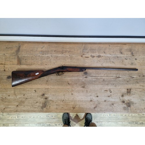 16 - An antique percussion rifle with curved walnut butt, 101cm long, barrel sealed. Note:- no in-house P... 