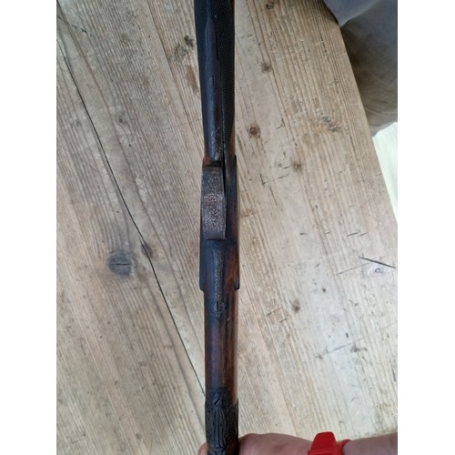 16 - An antique percussion rifle with curved walnut butt, 101cm long, barrel sealed. Note:- no in-house P... 