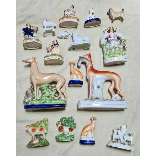 158 - A box of assorted Staffordshire pottery horses and dog figures.