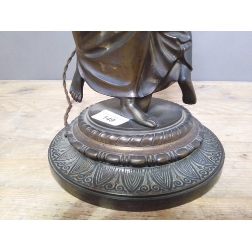 149 - A late 19th century weight spelter lamp base, height 53cm.