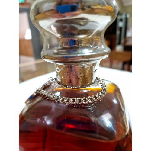 93 - A bottle of Hennessy Cognac, Decanter, 40% vol, 70cl, in a book style blue presentation case.