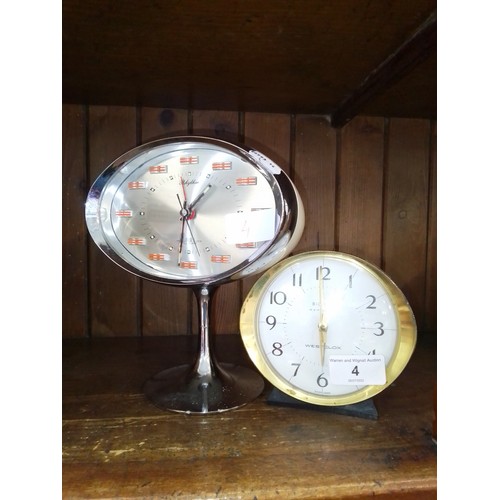 4 - Two vintage clocks.