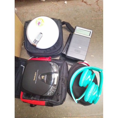 44 - A Sony Walkman together with a Technics portable CD player, a Psion Organiser and a pair of Beats by... 