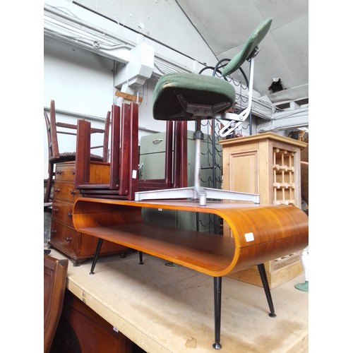 803 - three items of furniture comprising a retro style coffee table, an industrial style swivel chair and... 