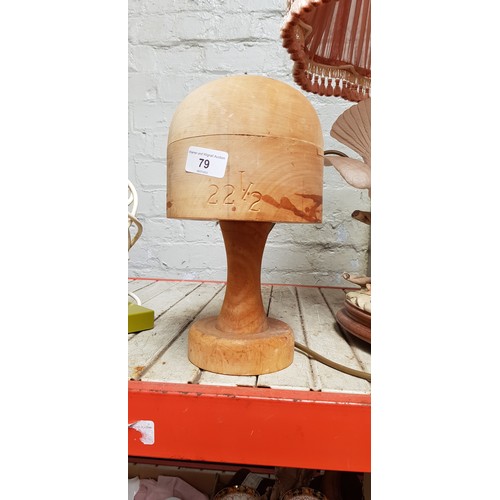 79 - A milliners wooden hat block, size 22 1/2